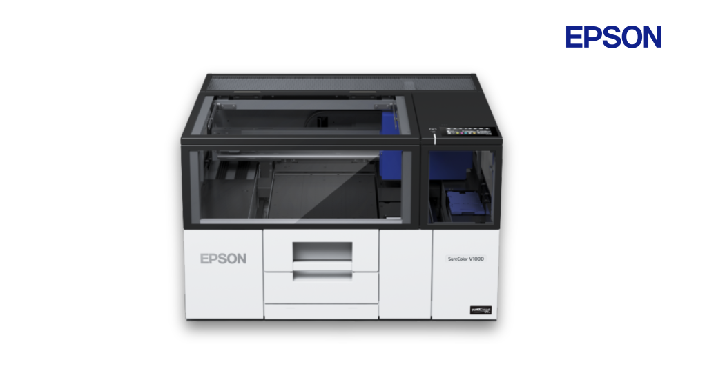 Mesin printer UV Epson V1000 canggih untuk cetak kustom printer merchandise dan objek bertekstur 3D.