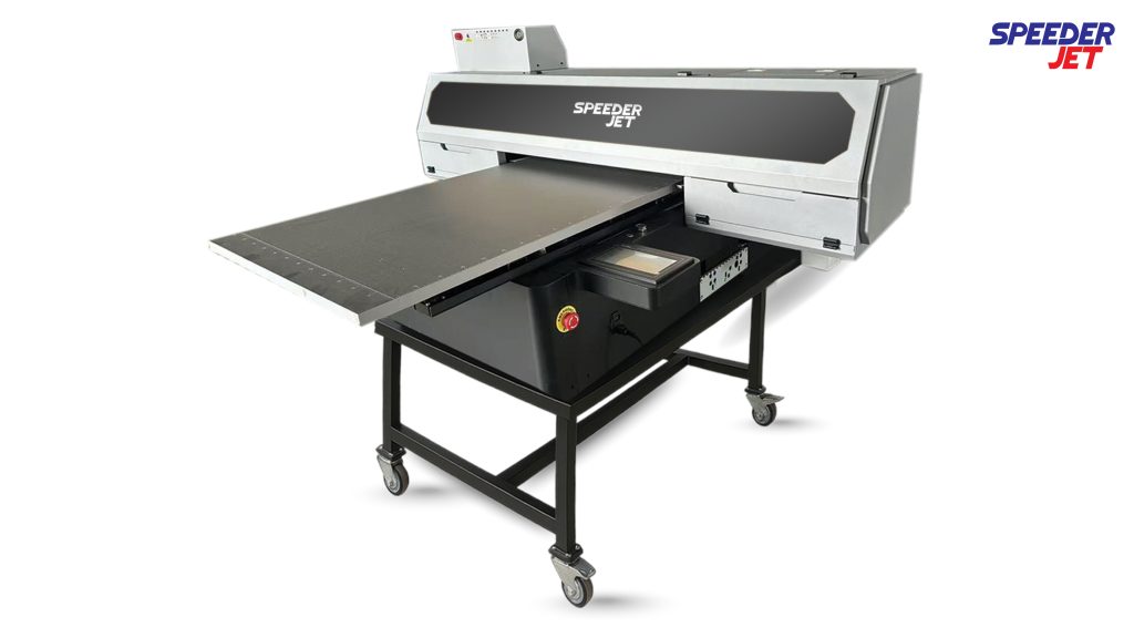 Mesin printer SpeederJET model Grando UV 60 cm yang dilengkapi kaki meja besi roda, berfungsi sebagai printer UV untuk cetak printer merchandise.