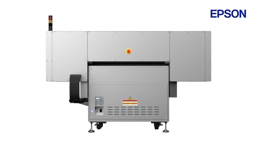 Bodi belakang printer UV Epson V4000 dilengkapi tombol emergency stop dan indikator lampu tower.